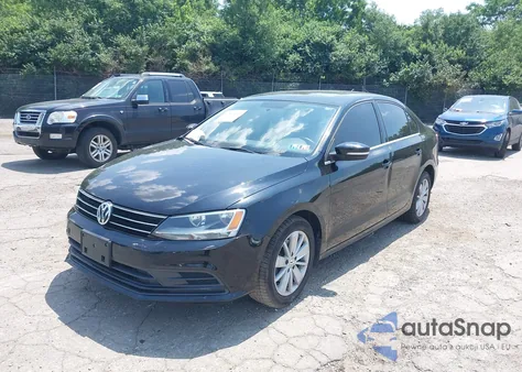 2015 Volkswagen Jetta 1.8T Se z USA, uszkodzony, nr VIN 3VWD17AJ5FM319637
